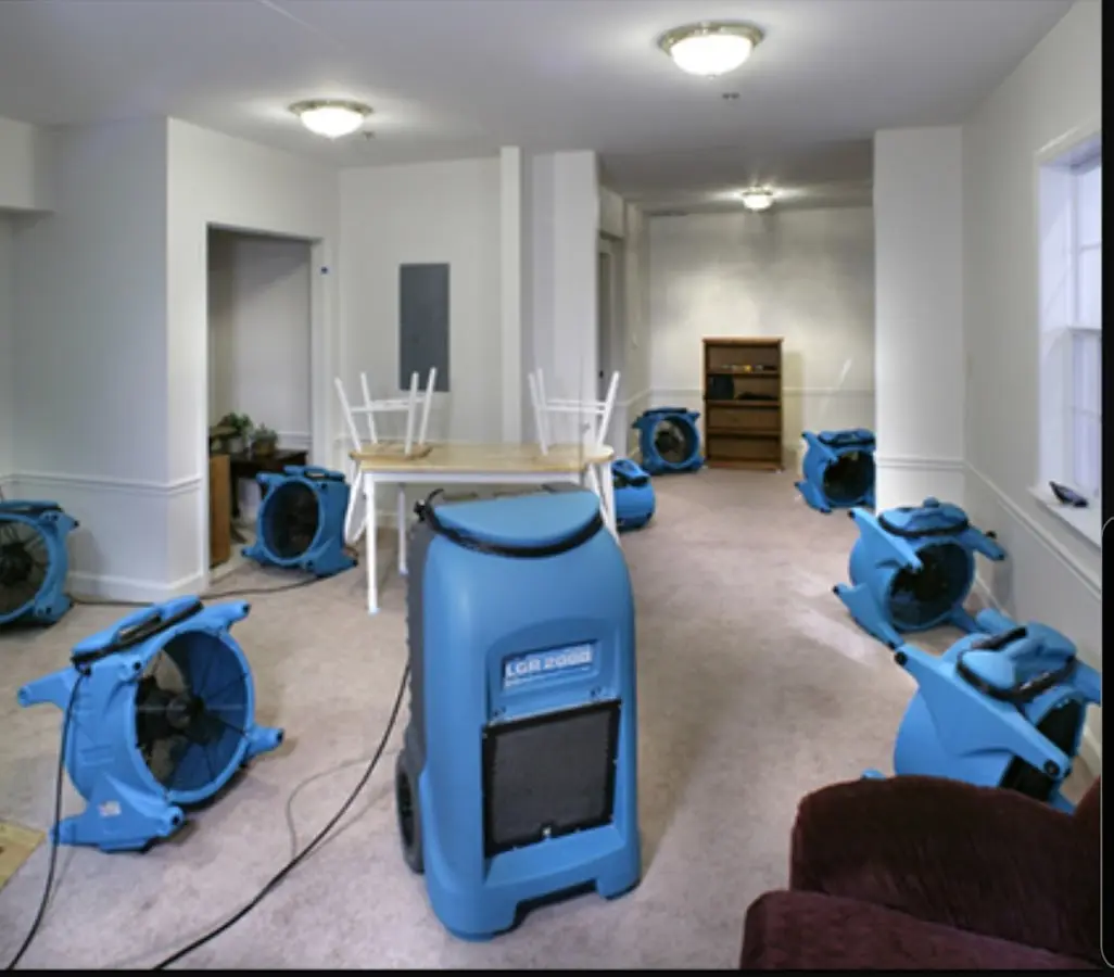 Air movers and dehumidifier setup for Water Damage Restoration in Salton City